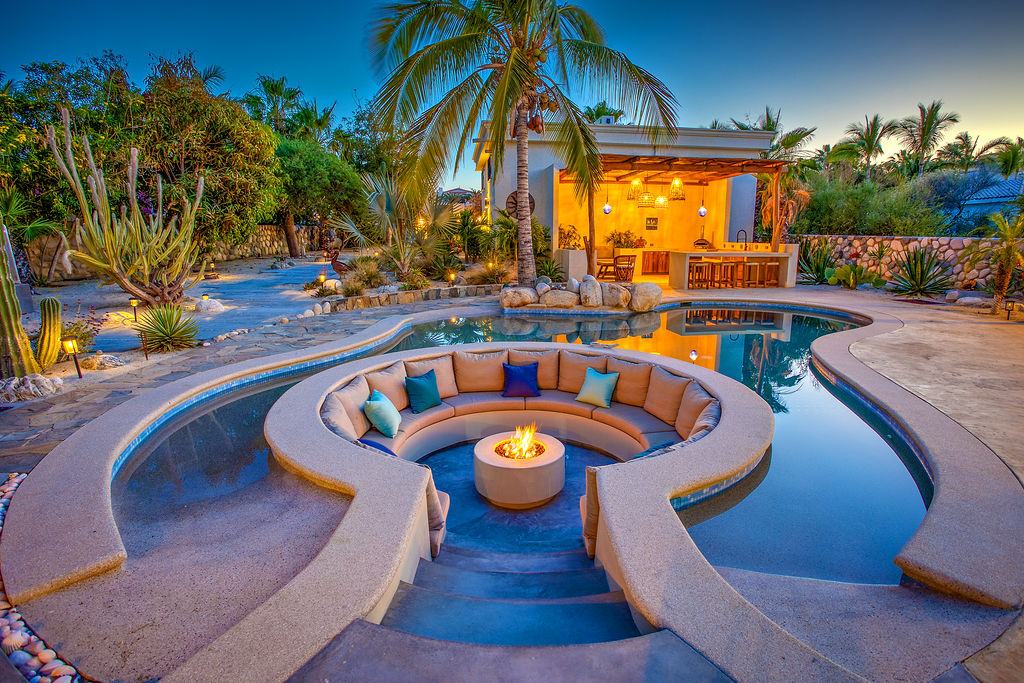 Fire pit area with string lights